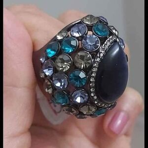 Striking Black and Blue Statement Ring with Intricate Metalwork